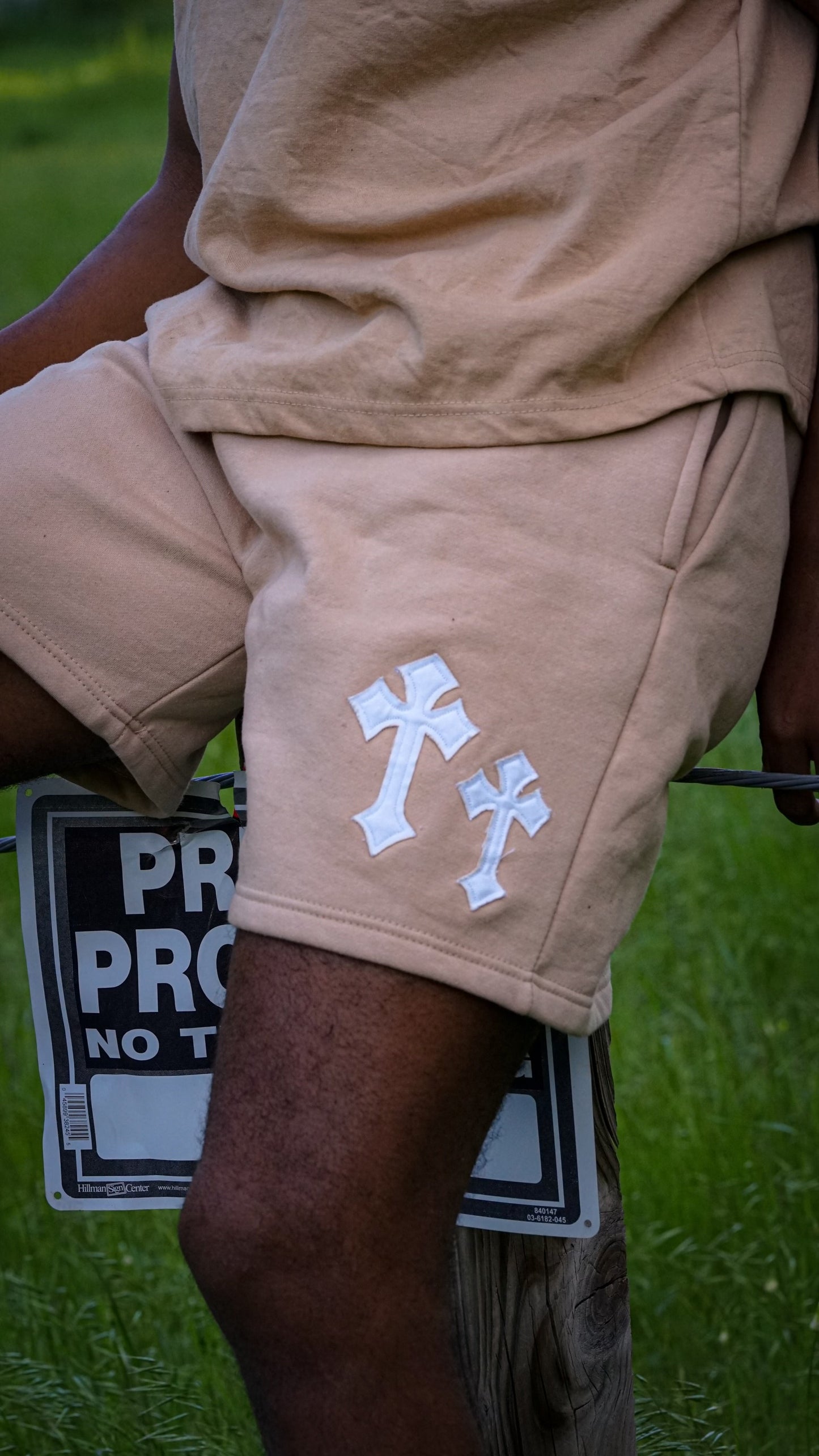 "Cross Logo-Distressed Sweat Shorts"